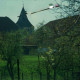 ARH NL Machinowski 164, Blick von einer Obstwiese in Richtung Kirche, Jeinsen