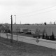 Archiv der Region Hannover, ARH NL Mellin 02-100/0010, Blick vom Mühlenweg auf die Gebäude an der Straße "Vor dem Celler Tor" mit der Pankratiuskirche im Hintergrund, Burgdorf