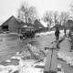 ARH NL Mellin 02-101/0018, Traktor auf einer überschwemmten Straße im Winter