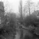 Archiv der Region Hannover, ARH NL Mellin 02-123/0013, Blick von einer Brücke auf einen Fluss in einer Stadt