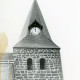 Stadtarchiv Neustadt a. Rbge., ARH Slg. Bartling 4662, Blick auf den oberen Teil des mittelalterlichen Turms der Gorgonius-Kirche sowie den Helm mit Uhr von Norden, Niedernstöcken